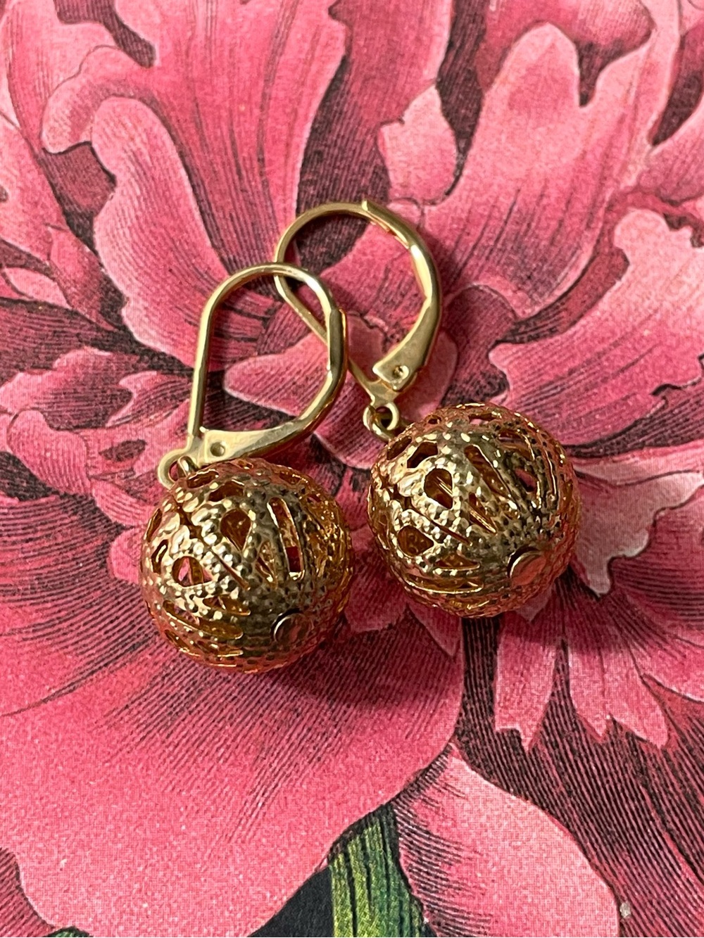 Goldtone filigree orb dangle leverback earrings